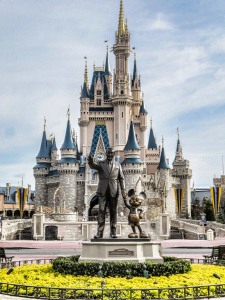 Walt and Mickey in front of Cinderella's Castle at Walt Disney World.